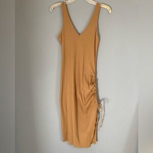 A new day dress worn once! Ruched side with slit, camel color